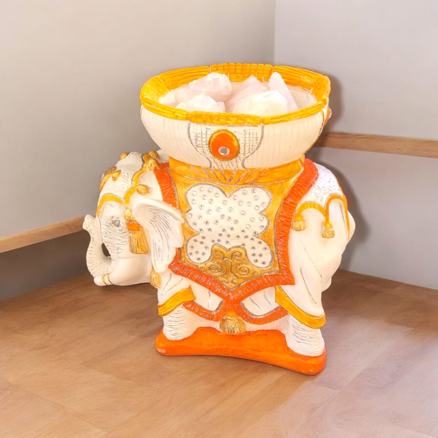 Elefante con piedras de cuarzo rosa